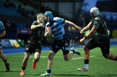 110126 - Cardiff Rugby U18s v Ospreys U18, WRU U18 Regional Age Grade Championship -  Harry Kinsey of Cardiff Rugby is tackled just short of the line