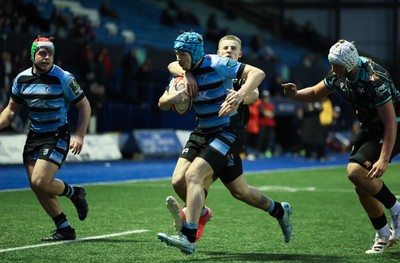110126 - Cardiff Rugby U18s v Ospreys U18, WRU U18 Regional Age Grade Championship -  Harry Kinsey of Cardiff Rugby is tackled just short of the line