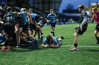 110126 - Cardiff Rugby U18s v Ospreys U18, WRU U18 Regional Age Grade Championship -  Evan Hughes of Cardiff Rugby powers over to score try