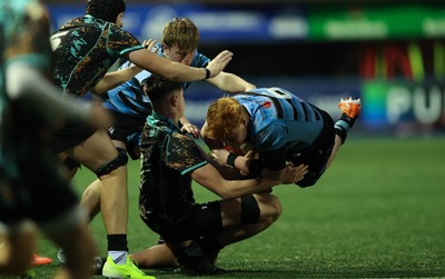 110126 - Cardiff Rugby U18s v Ospreys U18, WRU U18 Regional Age Grade Championship -  Sonny McCabe of Cardiff Rugby is tackled