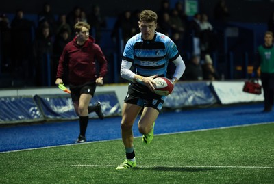 110126 - Cardiff Rugby U18s v Ospreys U18, WRU U18 Regional Age Grade Championship -  Will Adams of Cardiff Rugby races in to score try