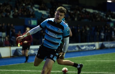 110126 - Cardiff Rugby U18s v Ospreys U18, WRU U18 Regional Age Grade Championship -  Will Adams of Cardiff Rugby races in to score try