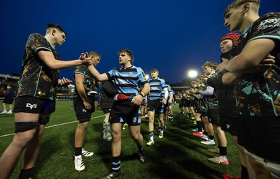 110126 - Cardiff Rugby U18s v Ospreys U18, WRU U18 Regional Age Grade Championship -  Players applaud each other off the pitch at the end of the match