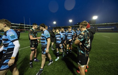 110126 - Cardiff Rugby U18s v Ospreys U18, WRU U18 Regional Age Grade Championship -  Players applaud each other off the pitch at the end of the match