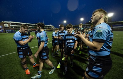 110126 - Cardiff Rugby U18s v Ospreys U18, WRU U18 Regional Age Grade Championship -  Players applaud each other off the pitch at the end of the match
