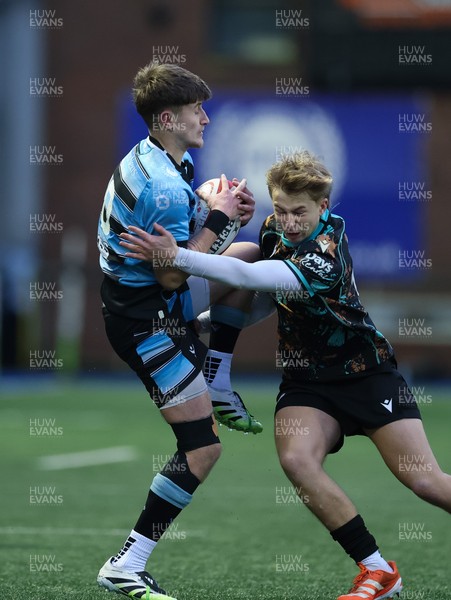 110126 - Cardiff Rugby U18s v Ospreys U18, WRU U18 Regional Age Grade Championship -  Isaac Manning Burke of Cardiff Rugby is tackled by Alfie Selby of Ospreys