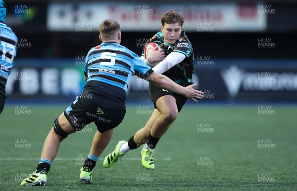 110126 - Cardiff Rugby U18s v Ospreys U18, WRU U18 Regional Age Grade Championship -  Zac Mizen of Ospreys takes on Evan Hughes of Cardiff Rugby