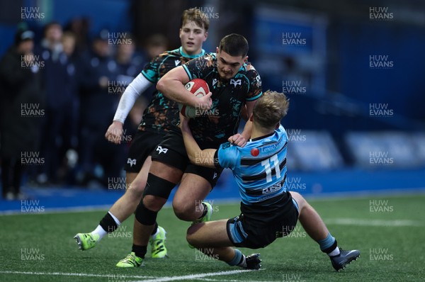 110126 - Cardiff Rugby U18s v Ospreys U18, WRU U18 Regional Age Grade Championship -  Ethan Bolch of Ospreys is tackled by Harvey Bryant of Cardiff Rugby
