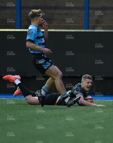 110126 - Cardiff Rugby U18s v Ospreys U18, WRU U18 Regional Age Grade Championship -  Dylan Quinn of Ospreys races in to score try