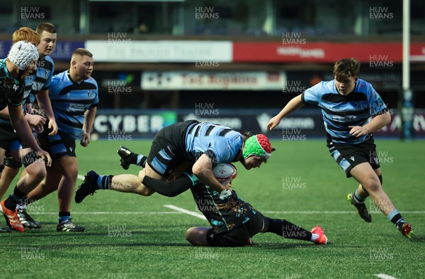 110126 - Cardiff Rugby U18s v Ospreys U18, WRU U18 Regional Age Grade Championship -  Alfie Prygodzicz of Cardiff Rugby Is tackled