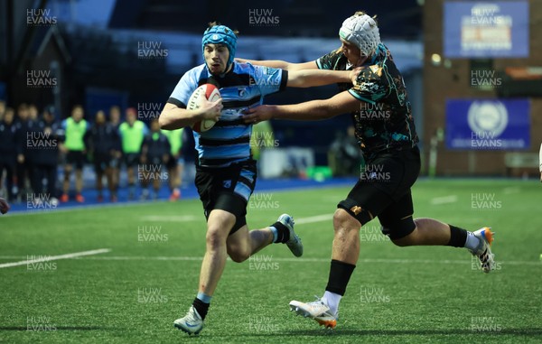 110126 - Cardiff Rugby U18s v Ospreys U18, WRU U18 Regional Age Grade Championship -  Harry Kinsey of Cardiff Rugby is tackled just short of the line