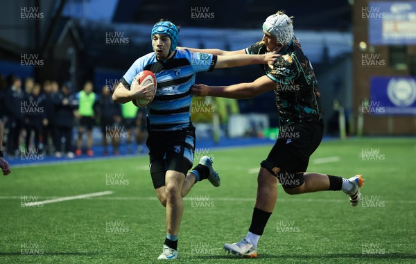 110126 - Cardiff Rugby U18s v Ospreys U18, WRU U18 Regional Age Grade Championship -  Harry Kinsey of Cardiff Rugby is tackled just short of the line