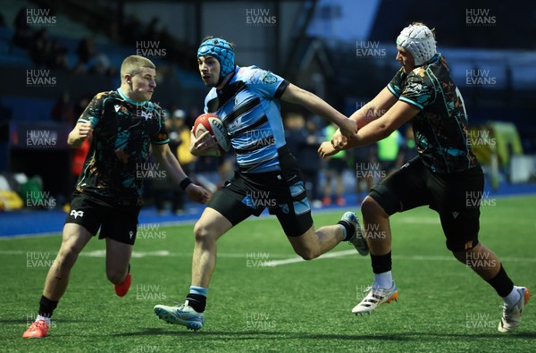 110126 - Cardiff Rugby U18s v Ospreys U18, WRU U18 Regional Age Grade Championship -  Harry Kinsey of Cardiff Rugby is tackled just short of the line