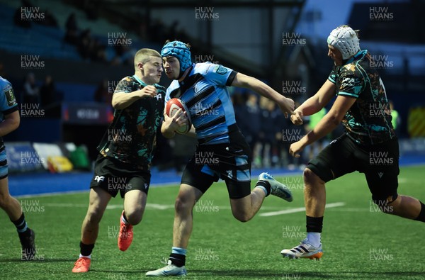 110126 - Cardiff Rugby U18s v Ospreys U18, WRU U18 Regional Age Grade Championship -  Harry Kinsey of Cardiff Rugby is tackled just short of the line