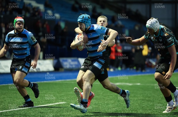 110126 - Cardiff Rugby U18s v Ospreys U18, WRU U18 Regional Age Grade Championship -  Harry Kinsey of Cardiff Rugby is tackled just short of the line