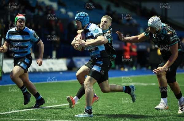 110126 - Cardiff Rugby U18s v Ospreys U18, WRU U18 Regional Age Grade Championship -  Harry Kinsey of Cardiff Rugby is tackled just short of the line