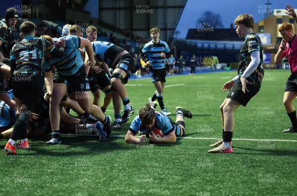 110126 - Cardiff Rugby U18s v Ospreys U18, WRU U18 Regional Age Grade Championship -  Evan Hughes of Cardiff Rugby powers over to score try