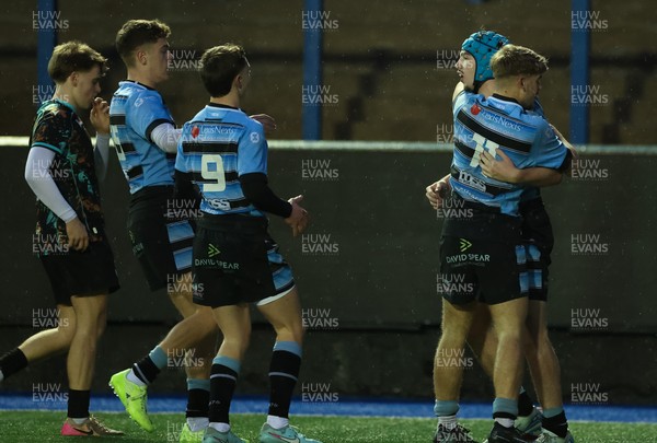 110126 - Cardiff Rugby U18s v Ospreys U18, WRU U18 Regional Age Grade Championship -  Harry Kinsey of Cardiff Rugby celebrates with team mates after he races in to score try