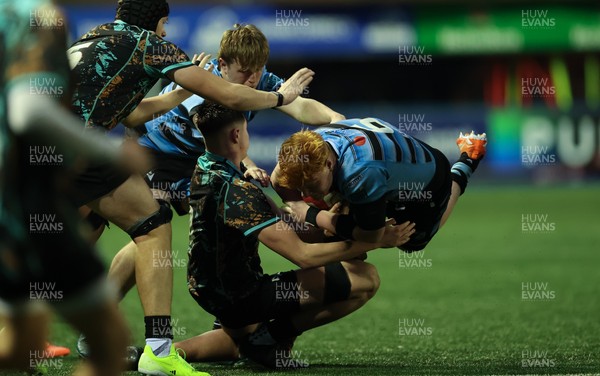 110126 - Cardiff Rugby U18s v Ospreys U18, WRU U18 Regional Age Grade Championship -  Sonny McCabe of Cardiff Rugby is tackled