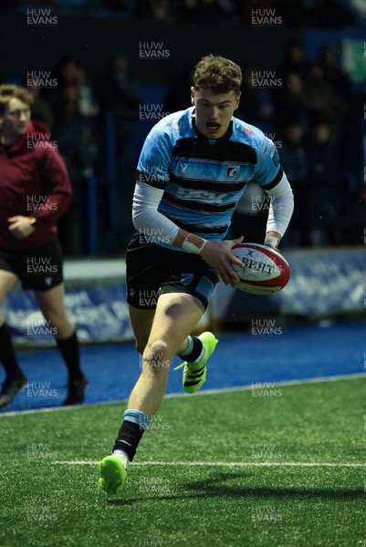 110126 - Cardiff Rugby U18s v Ospreys U18, WRU U18 Regional Age Grade Championship -  Will Adams of Cardiff Rugby races in to score try