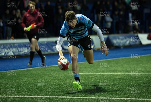 110126 - Cardiff Rugby U18s v Ospreys U18, WRU U18 Regional Age Grade Championship -  Will Adams of Cardiff Rugby races in to score try