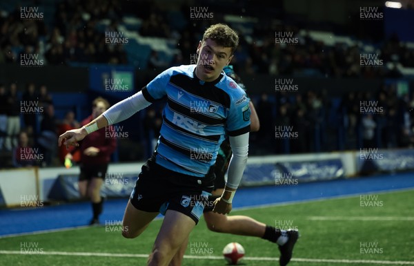 110126 - Cardiff Rugby U18s v Ospreys U18, WRU U18 Regional Age Grade Championship -  Will Adams of Cardiff Rugby races in to score try