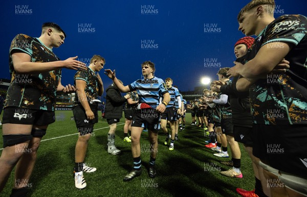 110126 - Cardiff Rugby U18s v Ospreys U18, WRU U18 Regional Age Grade Championship -  Players applaud each other off the pitch at the end of the match