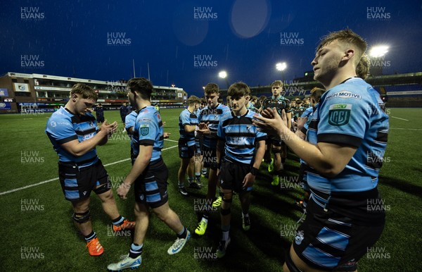 110126 - Cardiff Rugby U18s v Ospreys U18, WRU U18 Regional Age Grade Championship -  Players applaud each other off the pitch at the end of the match