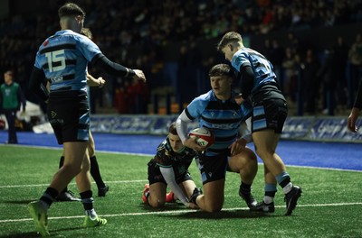 120226 - Cardiff Rugby U18 v Ospreys U18, WRU Regional Age Grade Championship Final - Ioan Leyshon of Cardiff celebrates with Will Adams of Cardiff and Harvey Bryant of Cardiff after he charges through to score try