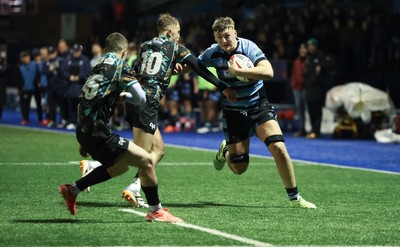 120226 - Cardiff Rugby U18 v Ospreys U18, WRU Regional Age Grade Championship Final - Lucca Alexander-White of Cardiff is tackled by  Dylan Quinn of Ospreys short of the line
