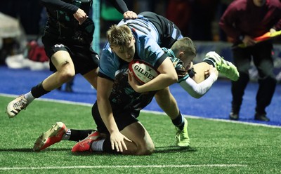 120226 - Cardiff Rugby U18 v Ospreys U18, WRU Regional Age Grade Championship Final - Lucca Alexander-White of Cardiff is tackled by  Dylan Quinn of Ospreys short of the line