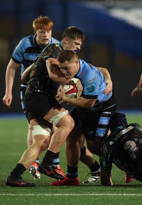 120226 - Cardiff Rugby U18 v Ospreys U18, WRU Regional Age Grade Championship Final - Isaac Jones of Cardiff is held