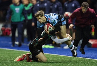 120226 - Cardiff Rugby U18 v Ospreys U18, WRU Regional Age Grade Championship Final - Harvey Bryant of Cardiff is tackled by Dylan Quinn of Ospreys