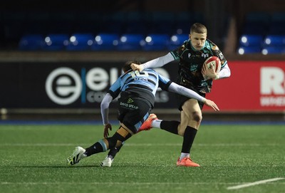 120226 - Cardiff Rugby U18 v Ospreys U18, WRU Regional Age Grade Championship Final - Dylan Quinn of Ospreys takes on Isaac Manning-Burke of Cardiff