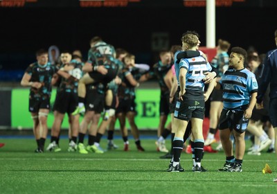 120226 - Cardiff Rugby U18 v Ospreys U18, WRU Regional Age Grade Championship Final - Ospreys celebrate after Fin Britton of Cardiff misses a penalty with the final kick of the match handing them the win