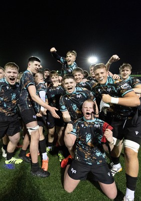 120226 - Cardiff Rugby U18 v Ospreys U18, WRU Regional Age Grade Championship Final - Ospreys players celebrate at the end of the match