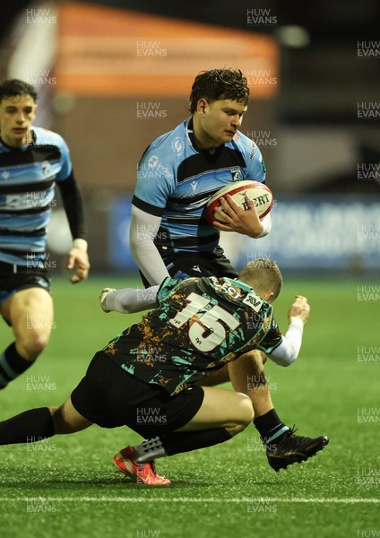 120226 - Cardiff Rugby U18 v Ospreys U18, WRU Regional Age Grade Championship Final - Ioan Leyshon of Cardiff takes on Dylan Quinn of Ospreys