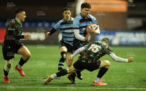120226 - Cardiff Rugby U18 v Ospreys U18, WRU Regional Age Grade Championship Final - Ioan Leyshon of Cardiff takes on Dylan Quinn of Ospreys