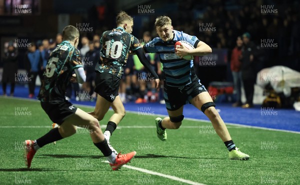 120226 - Cardiff Rugby U18 v Ospreys U18, WRU Regional Age Grade Championship Final - Lucca Alexander-White of Cardiff is tackled by  Dylan Quinn of Ospreys short of the line