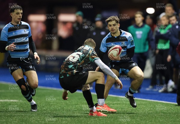 120226 - Cardiff Rugby U18 v Ospreys U18, WRU Regional Age Grade Championship Final - Harvey Bryant of Cardiff is tackled by Dylan Quinn of Ospreys