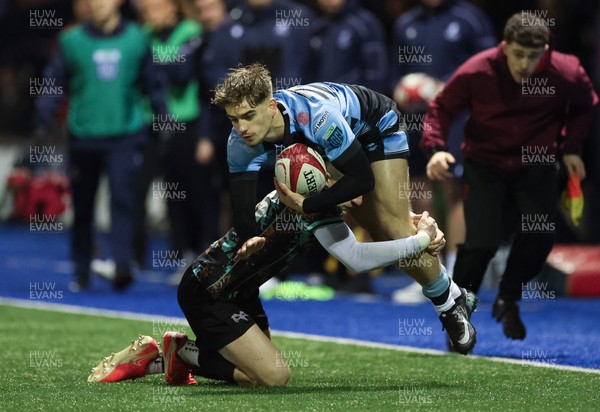 120226 - Cardiff Rugby U18 v Ospreys U18, WRU Regional Age Grade Championship Final - Harvey Bryant of Cardiff is tackled by Dylan Quinn of Ospreys