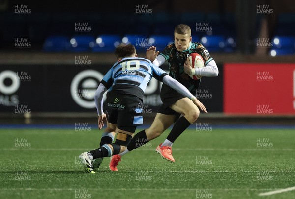 120226 - Cardiff Rugby U18 v Ospreys U18, WRU Regional Age Grade Championship Final - Dylan Quinn of Ospreys takes on Isaac Manning-Burke of Cardiff