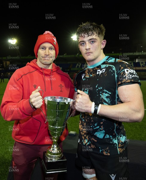 120226 - Cardiff Rugby U18 v Ospreys U18, WRU Regional Age Grade Championship Final - Wales U20 head coach Richard Whiffin presents Sam Morgan of Ospreys with the trophy