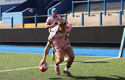 230826 - Cardiff Rugby U18 v Ospreys U18, WRU Regional Age Grade Championship - Theo Poole of Cardiff Rugby races in to score try