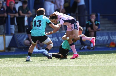 230826 - Cardiff Rugby U18 v Ospreys U18, WRU Regional Age Grade Championship - Devon Morris of Cardiff Rugby is tackled