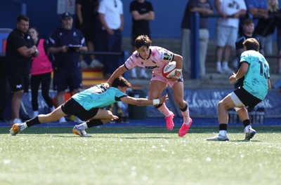 230826 - Cardiff Rugby U18 v Ospreys U18, WRU Regional Age Grade Championship - Devon Morris of Cardiff Rugby is tackled