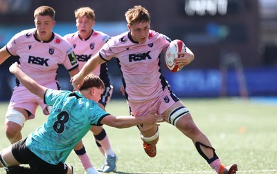 230826 - Cardiff Rugby U18 v Ospreys U18, WRU Regional Age Grade Championship - Liam Williams of Cardiff Rugby gets past Ronan Hire of Ospreys