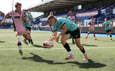 230826 - Cardiff Rugby U18 v Ospreys U18, WRU Regional Age Grade Championship - Dylan Quin of Ospreys races in to score try