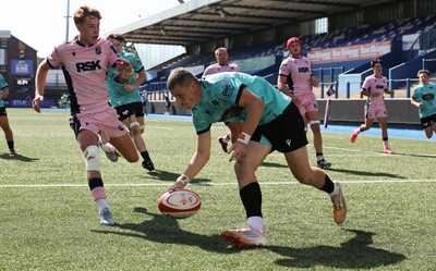 230826 - Cardiff Rugby U18 v Ospreys U18, WRU Regional Age Grade Championship - Dylan Quin of Ospreys races in to score try