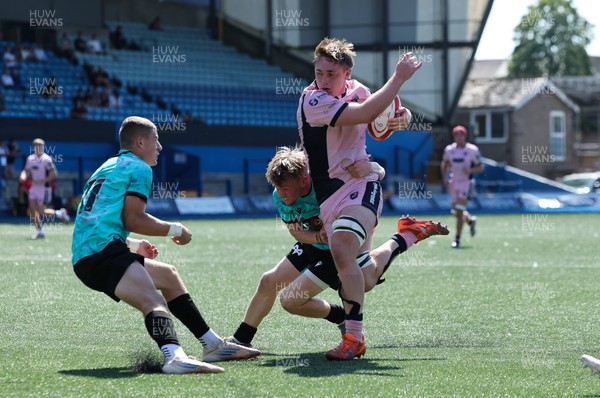 230826 - Cardiff Rugby U18 v Ospreys U18, WRU Regional Age Grade Championship - Liam Williams of Cardiff Rugby is tackled just short of the line